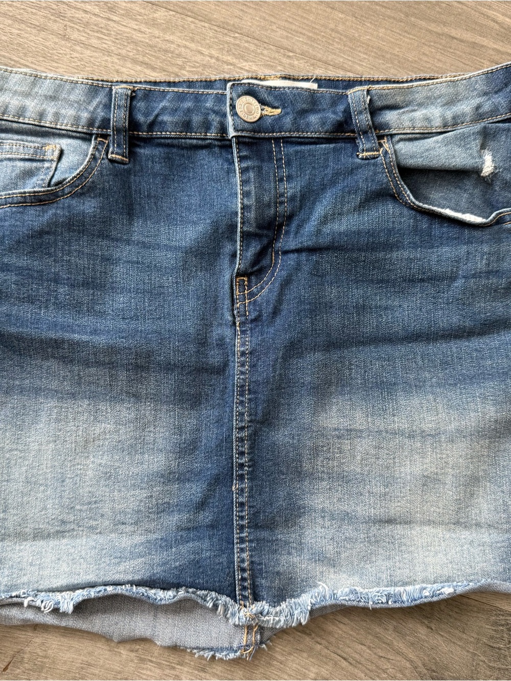 Blue Denim Mini Skirt with a Slightly Faded Wash Look